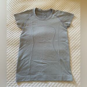Lululemon Blue Top. Size 6. (Can fit a 4 as well). Perfect condition.